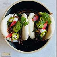 Two Lamb Baos with greens